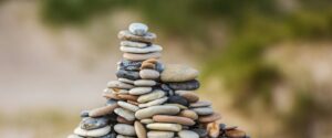 selective focus photography of stack of stones